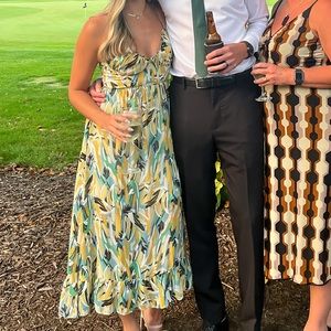 Green and yellow patterned midi dress